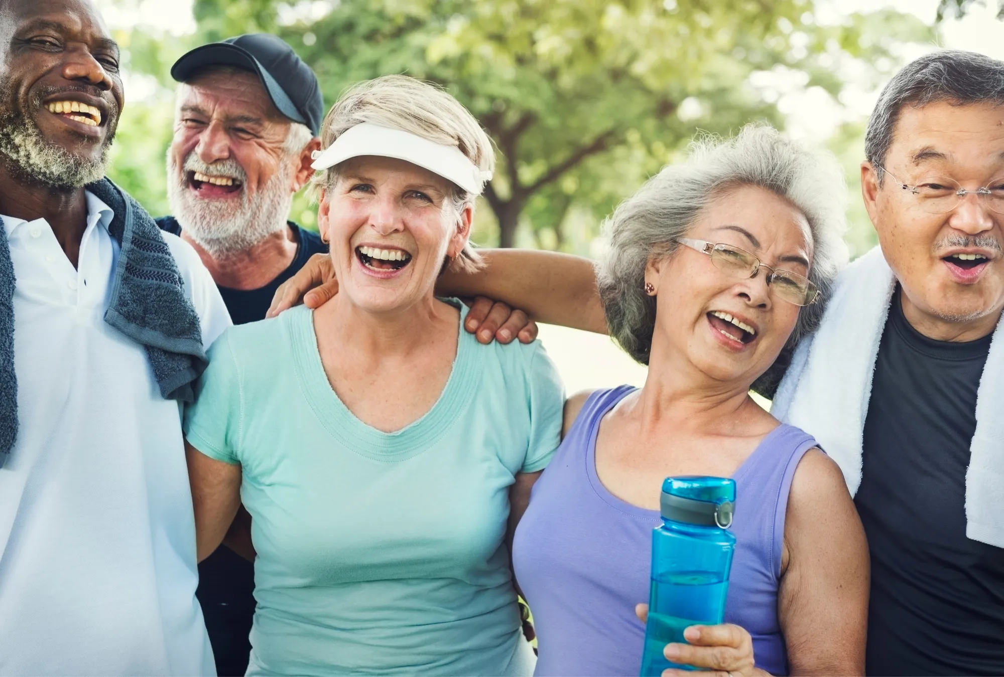 senior citizens smile after playing pickleball