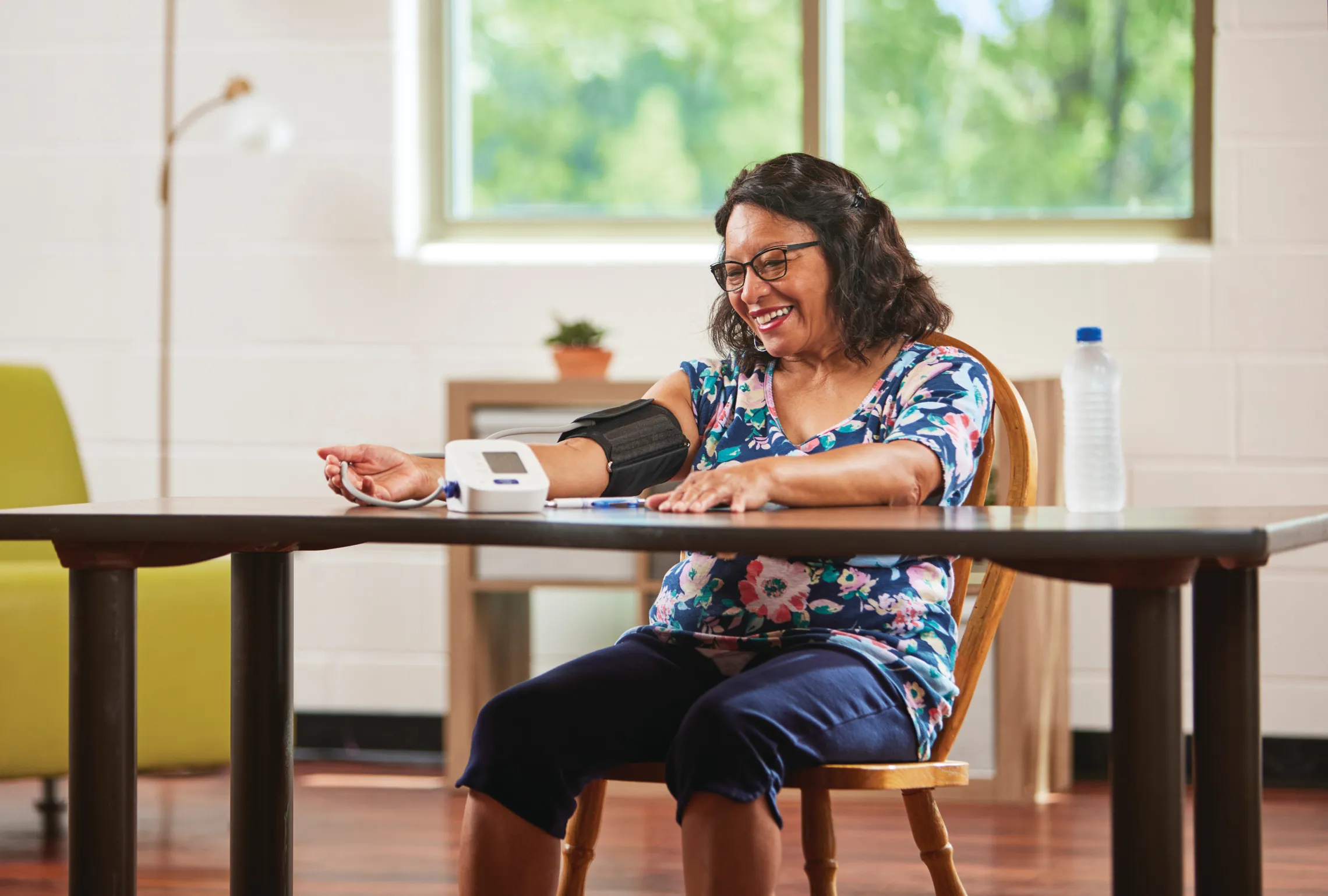 woman taking her blood pressure