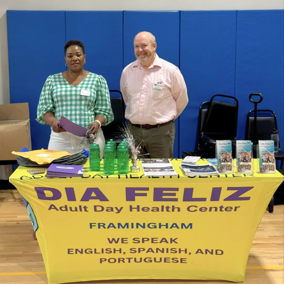 photo of two staff members from adult day health center