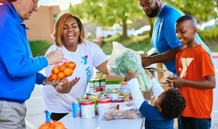 volunteers helping at food drive