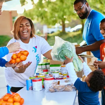 volunteers helping at food drive